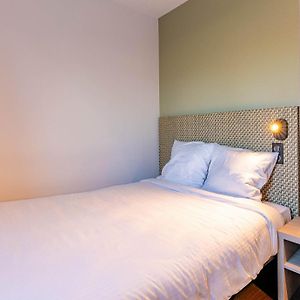 Kamer met een King Size Bed met de Toegang voor Gehandicapten